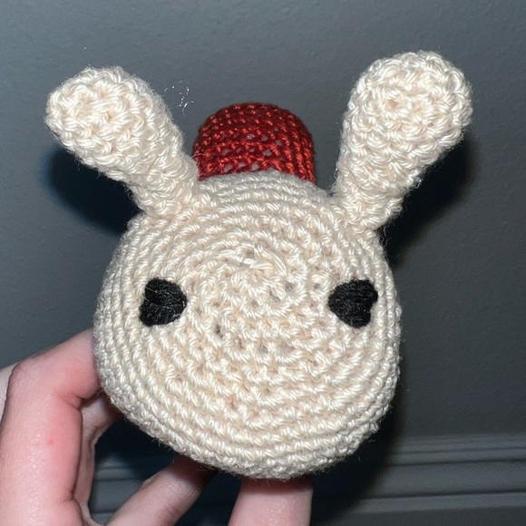 Hand a crocheted Sammy the Snail (Small)🐌 - Picture 7 of 7
